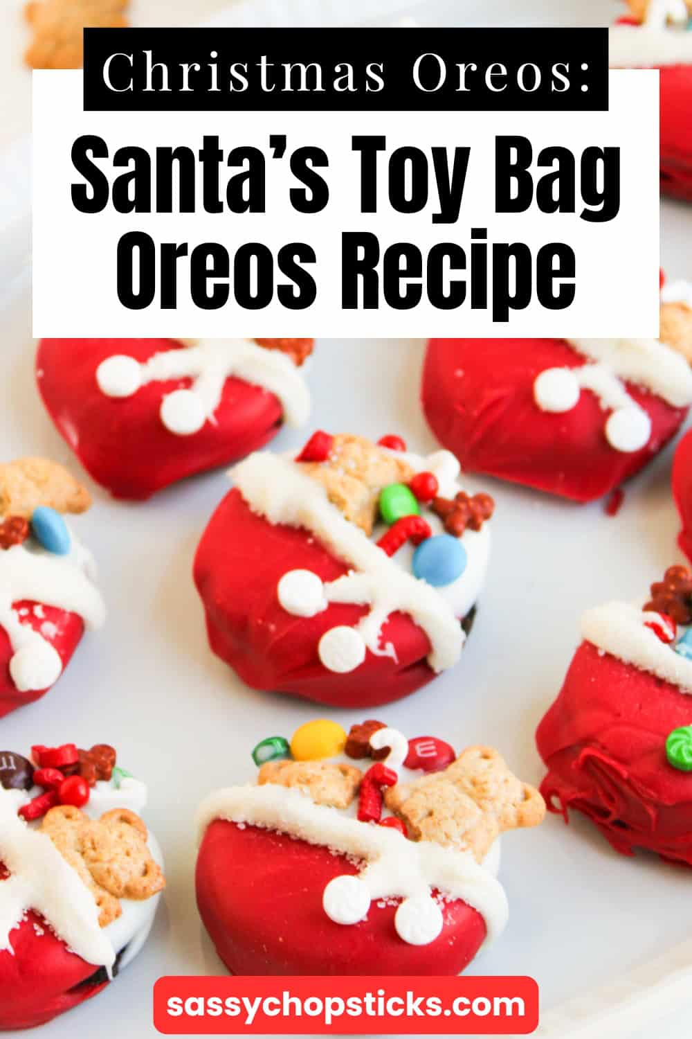 Red Santa’s toy bag oreos, topped with mini teddy bear cookies, colorful candies, and white icing details.