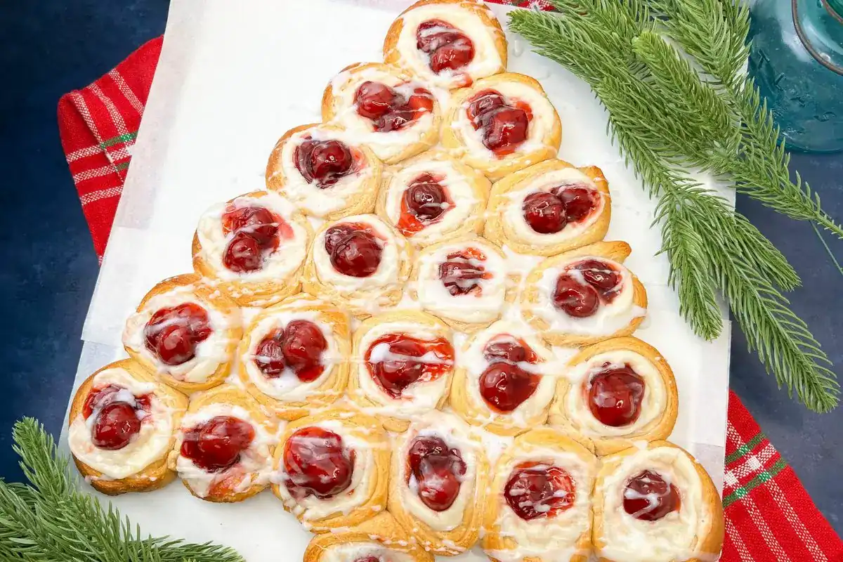 Flaky pastry filled with sweet cream cheese and shaped like a festive tree.