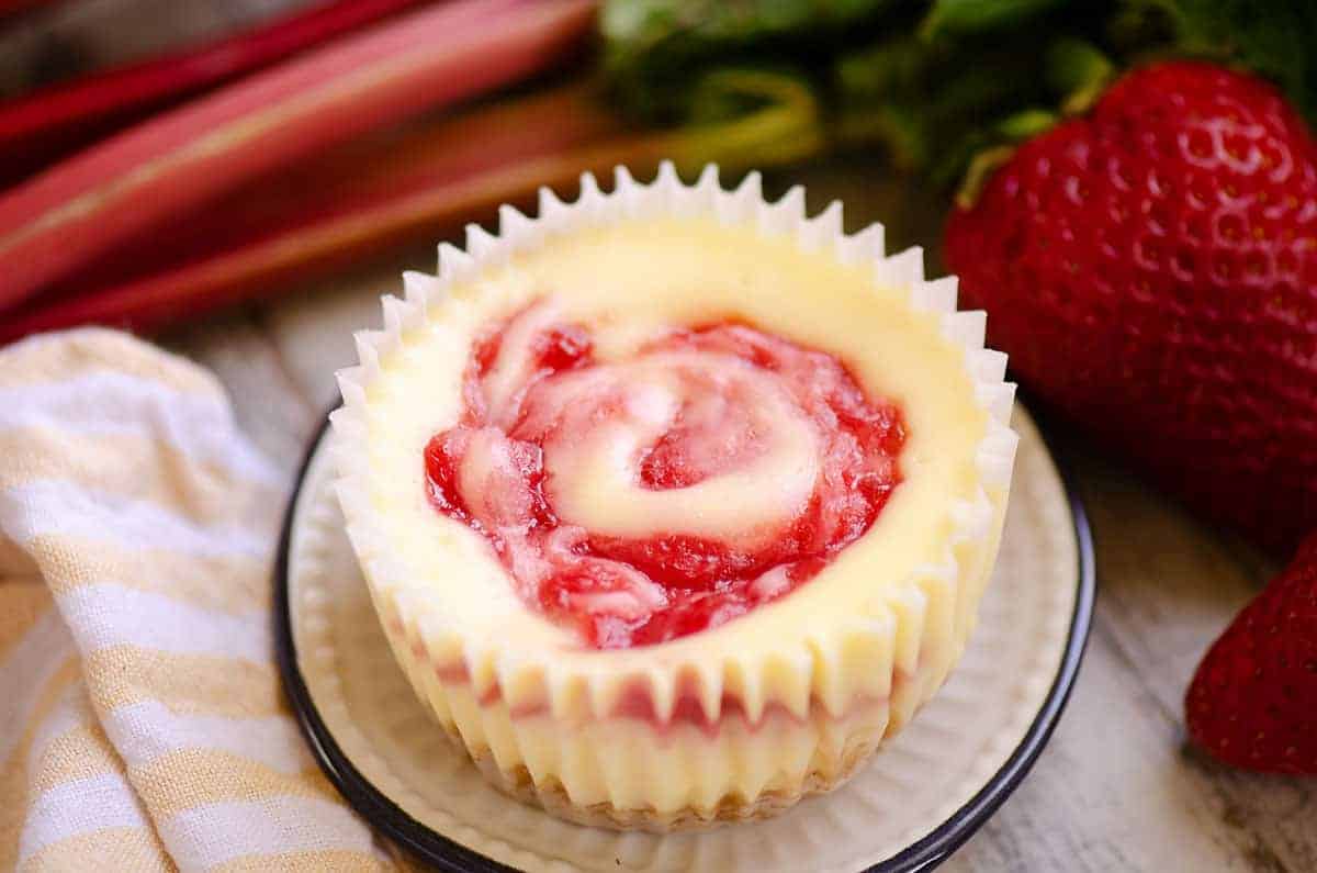 Strawberry rhubarb mini cheesecakes.