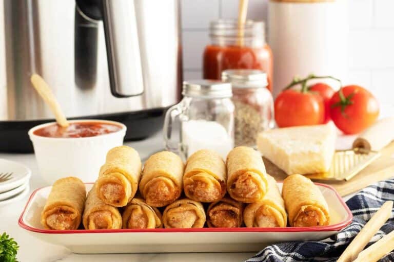 Golden pizza rolls on a plate.