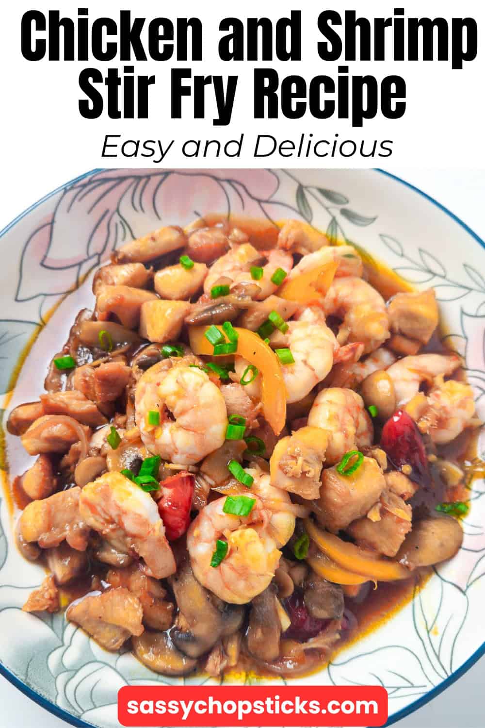 Shrimp and chicken stir fry with mushrooms, bell peppers, and green onions served in a bowl.