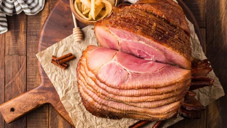 Tender ham glazed with honey and caramelized onions.