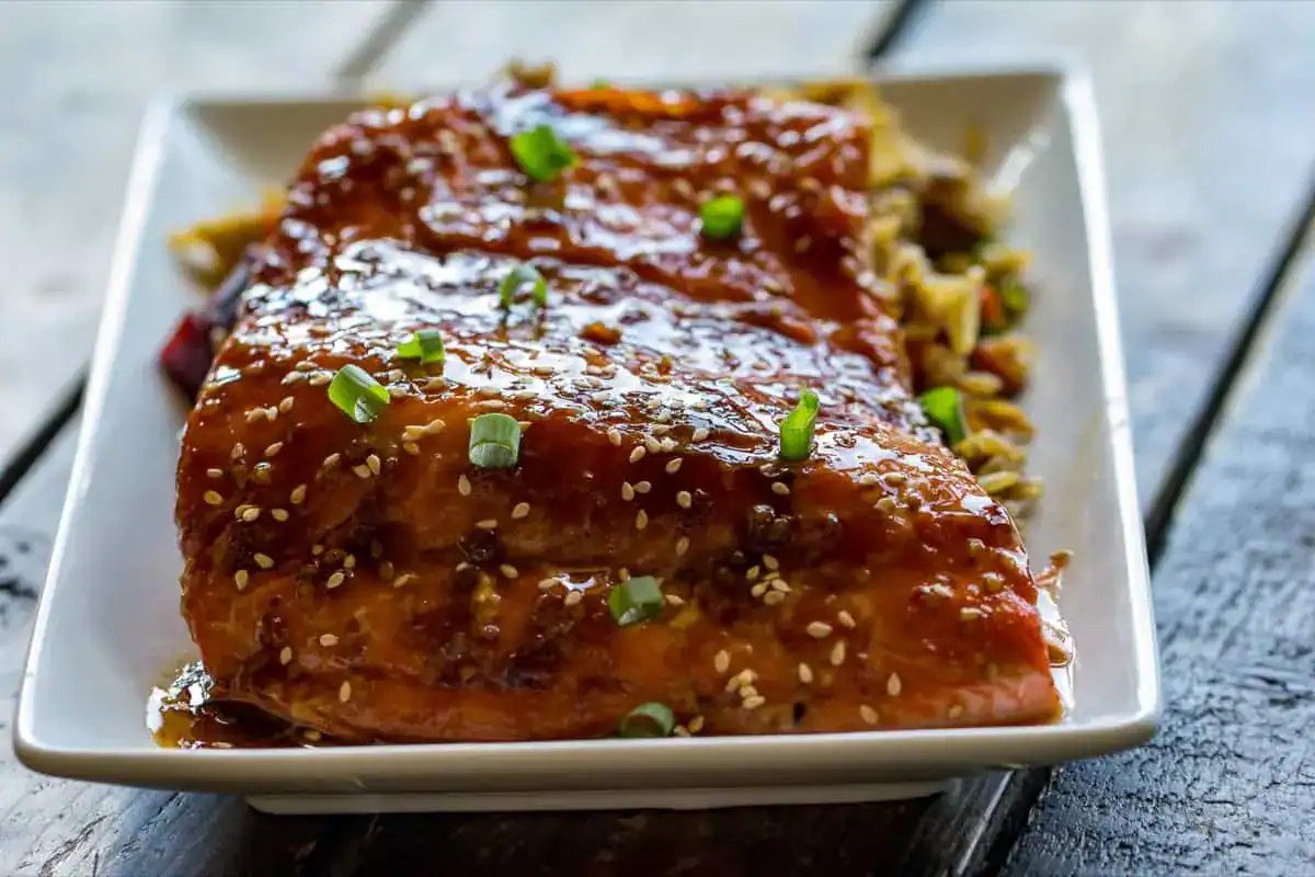 Salmon fillets grilled with teriyaki glaze.