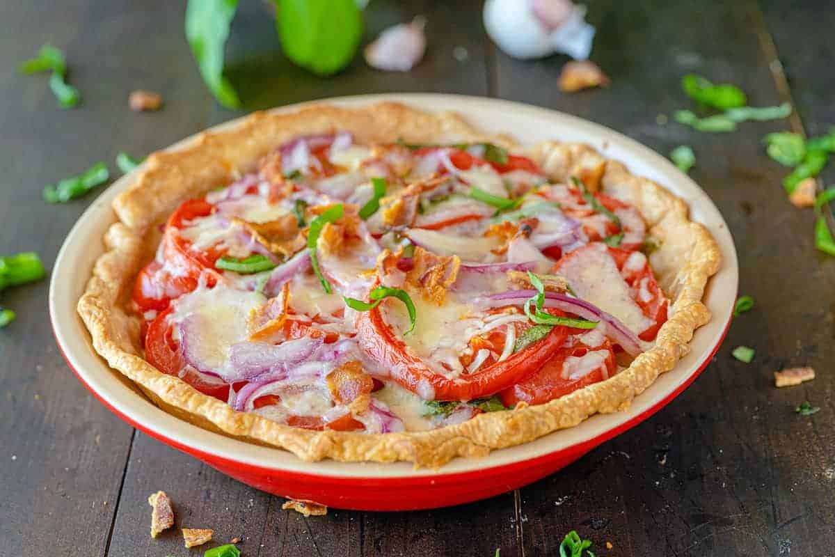 Savory tomato pie with herbs and flaky crust.