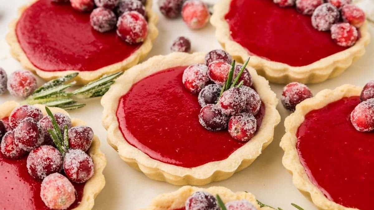 Mini cranberry tartlets with a crisp shell and vibrant berry filling.