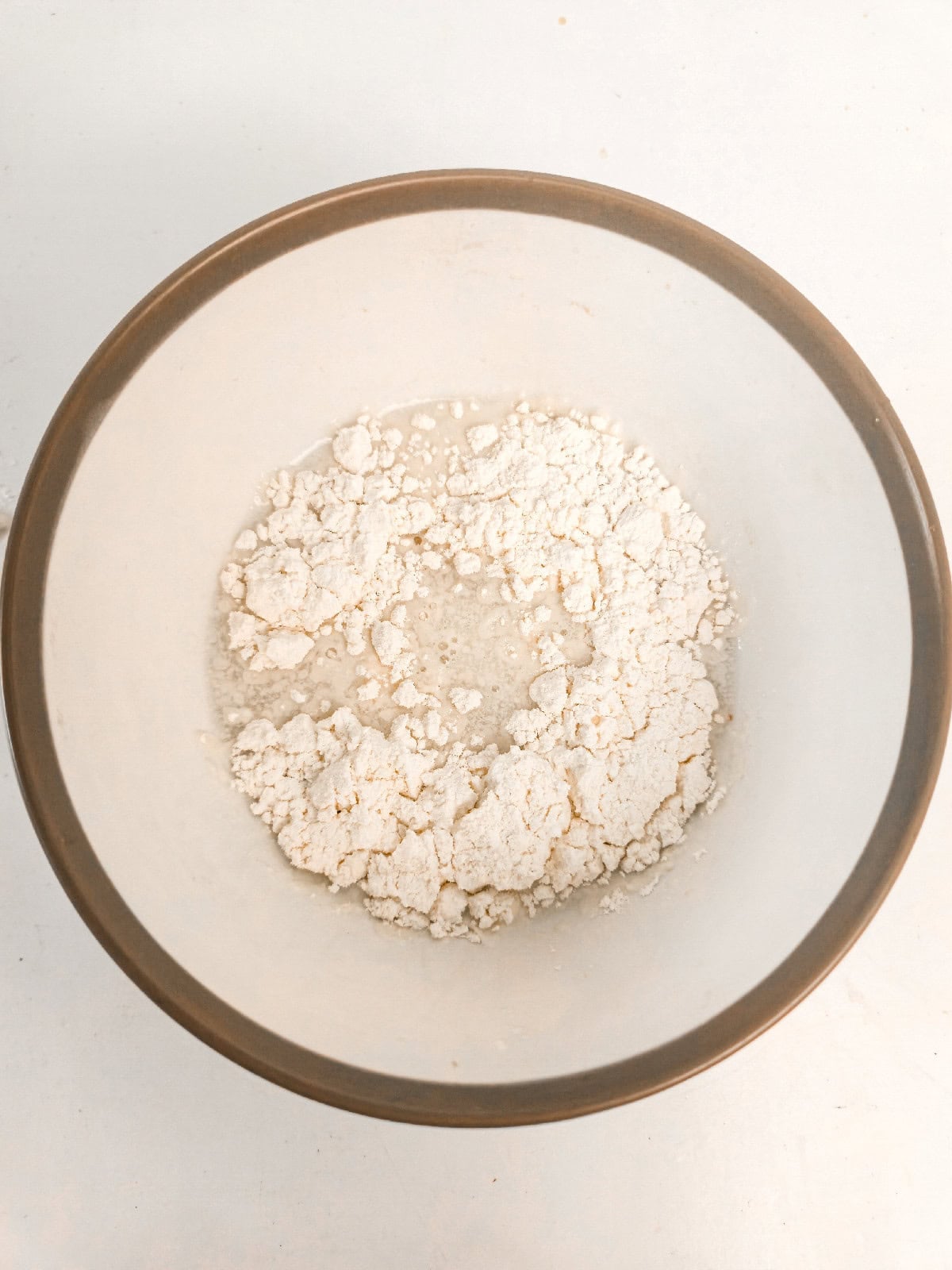 Bowl of flour prepared for coating sweet potatoes.