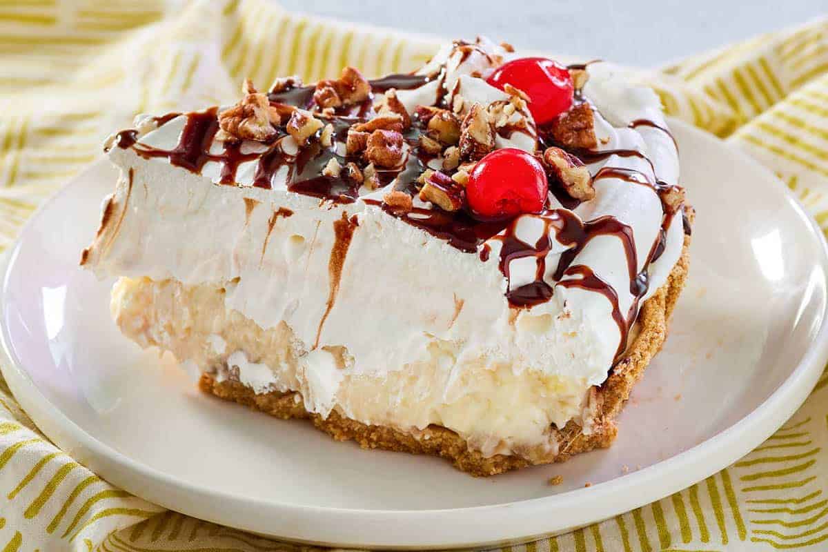 Dessert pie layered with banana, chocolate, and whipped cream.