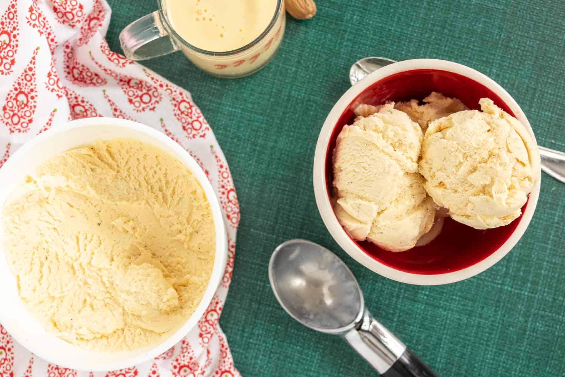 Creamy eggnog ice cream scooped into a dessert bowl.