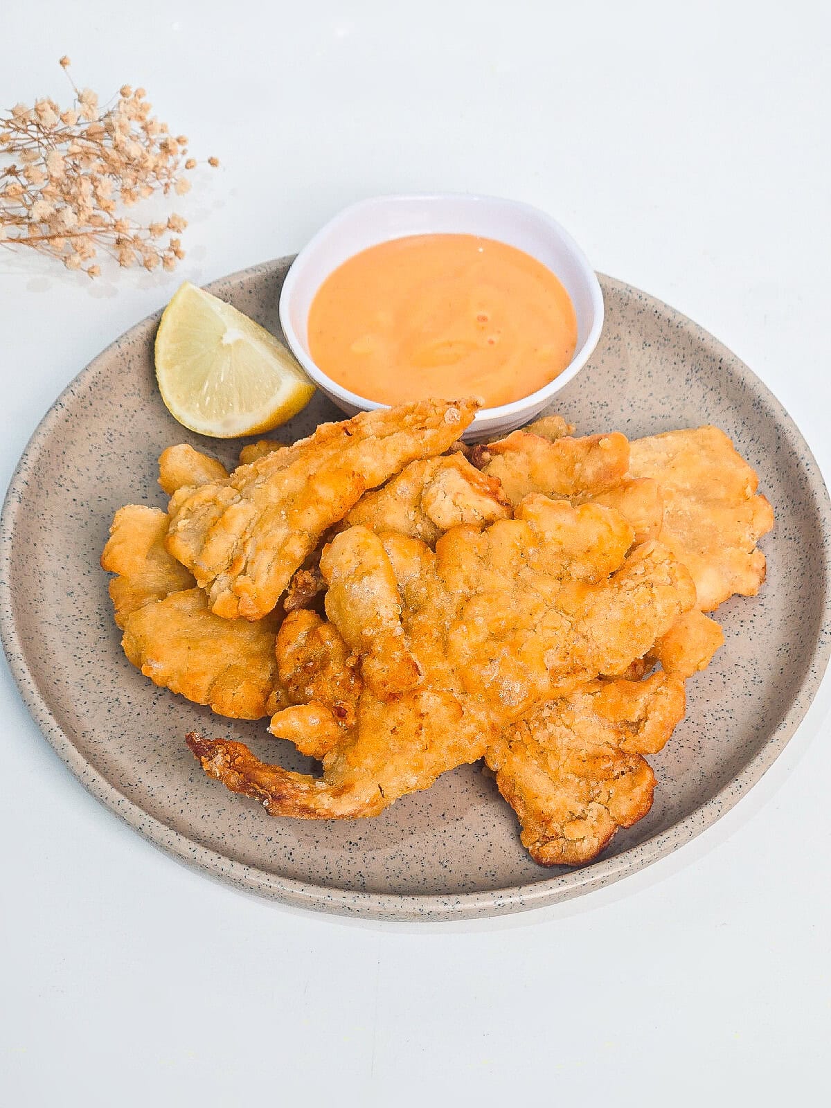 Close-up of crispy breaded air fryer oyster mushrooms showing crunchy texture.