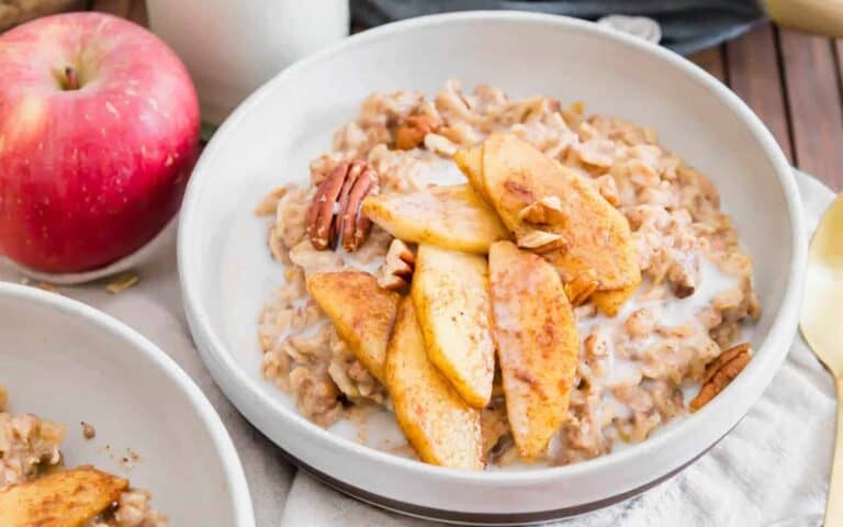 Warm oatmeal topped with apples and cinnamon.