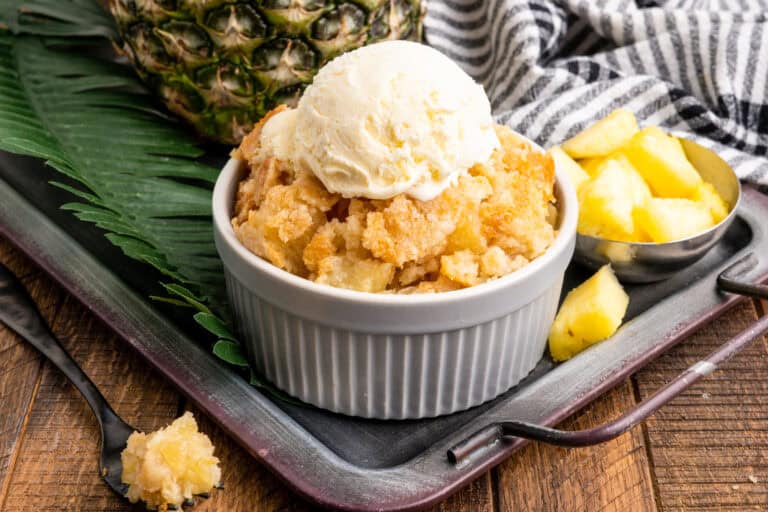 Pineapple dump cake with golden topping.