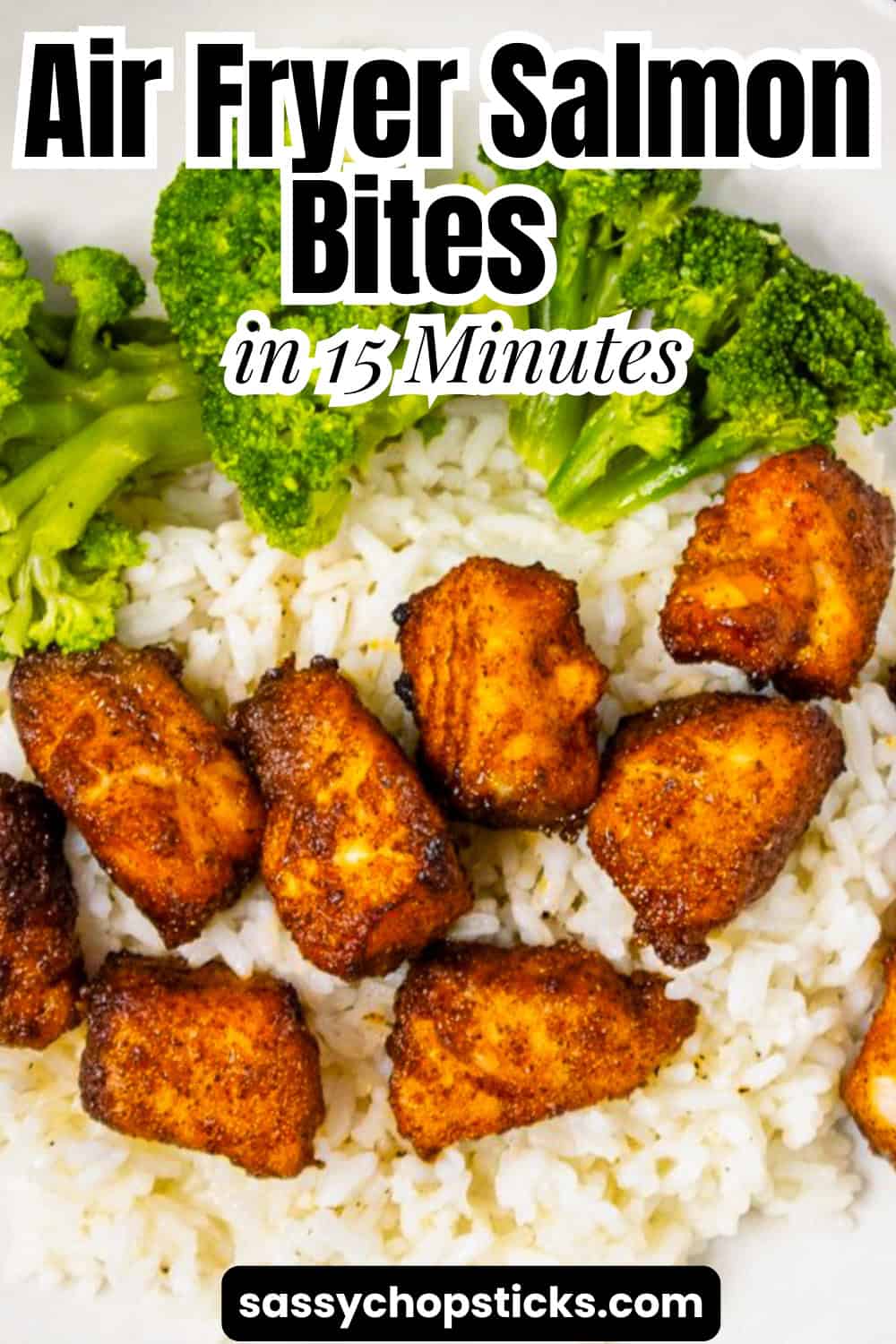 Air fryer salmon bites served over white rice with steamed broccoli in a bowl.