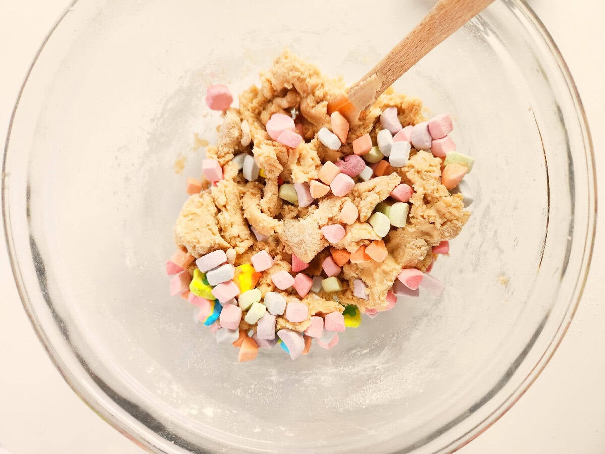 Lucky Charms marshmallows added to the cookie dough mixture.