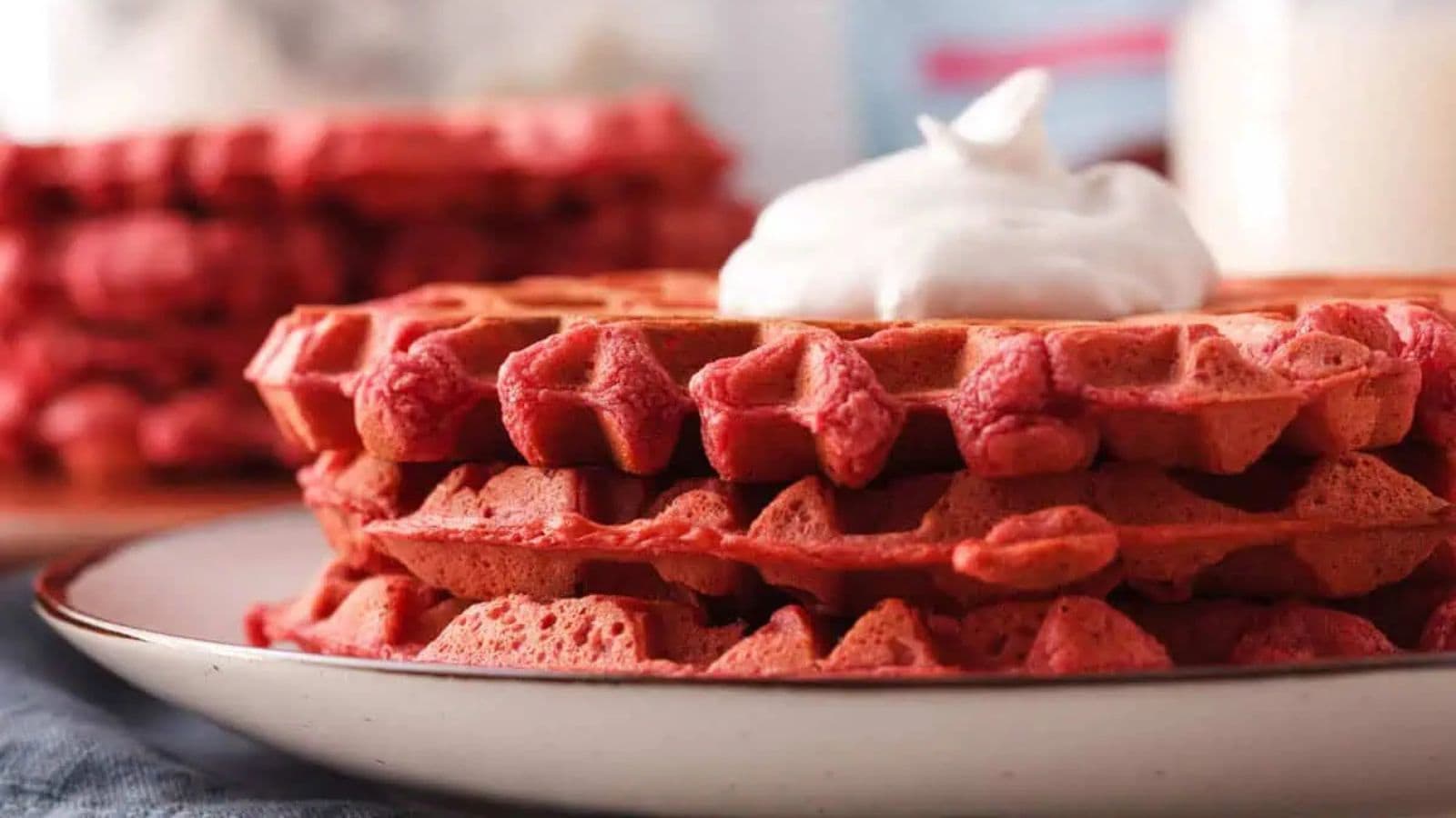 Vibrant beetroot waffles with a rich color and crisp, fluffy texture.