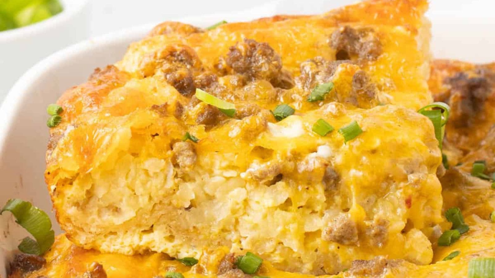 Sausage breakfast casserole with fluffy eggs, sausage, and melted cheese baked in one dish.