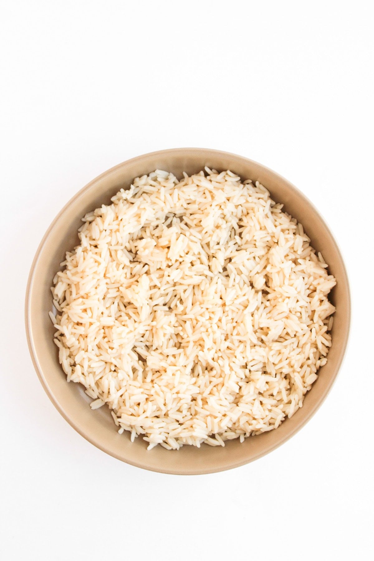 Cooked white rice in a bowl for serving.