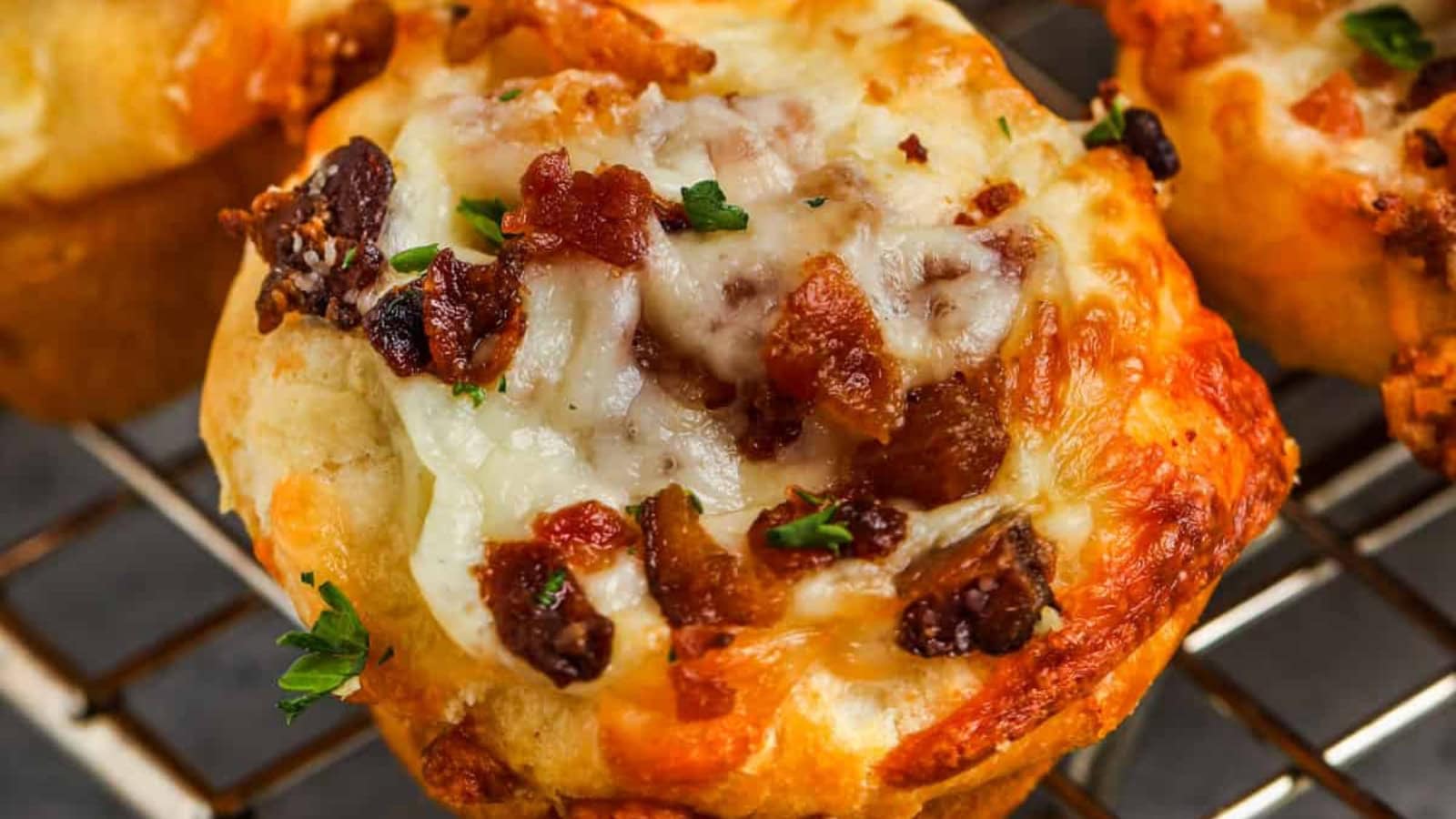 Biscuits baked fluffy with bacon and melted cheese throughout.