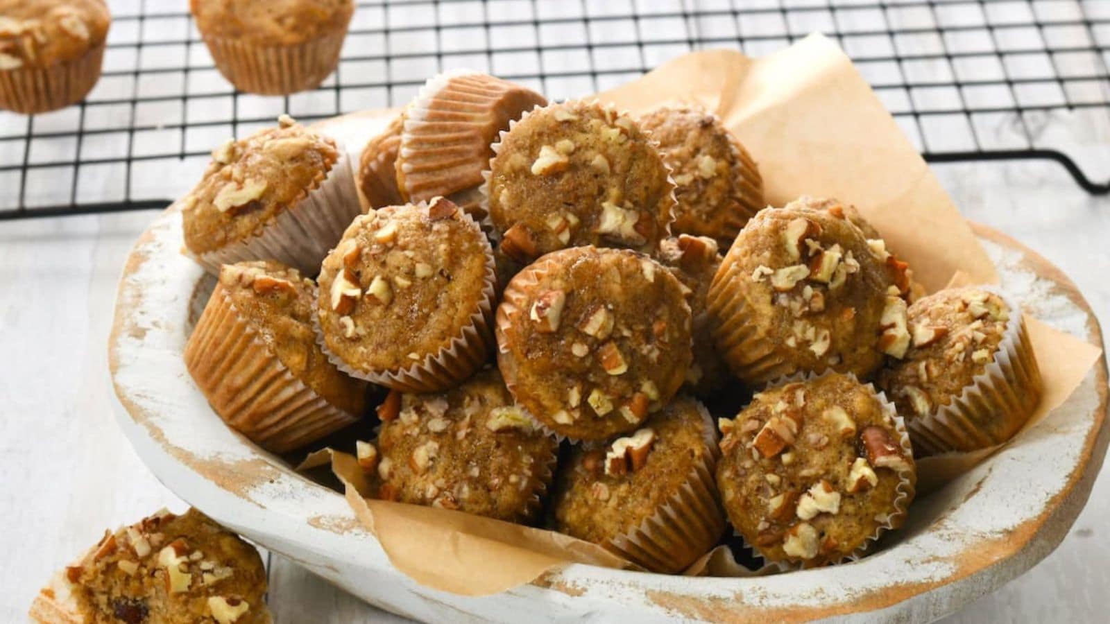 Banana nut mini muffins baked with crunchy nuts and moist banana flavor.