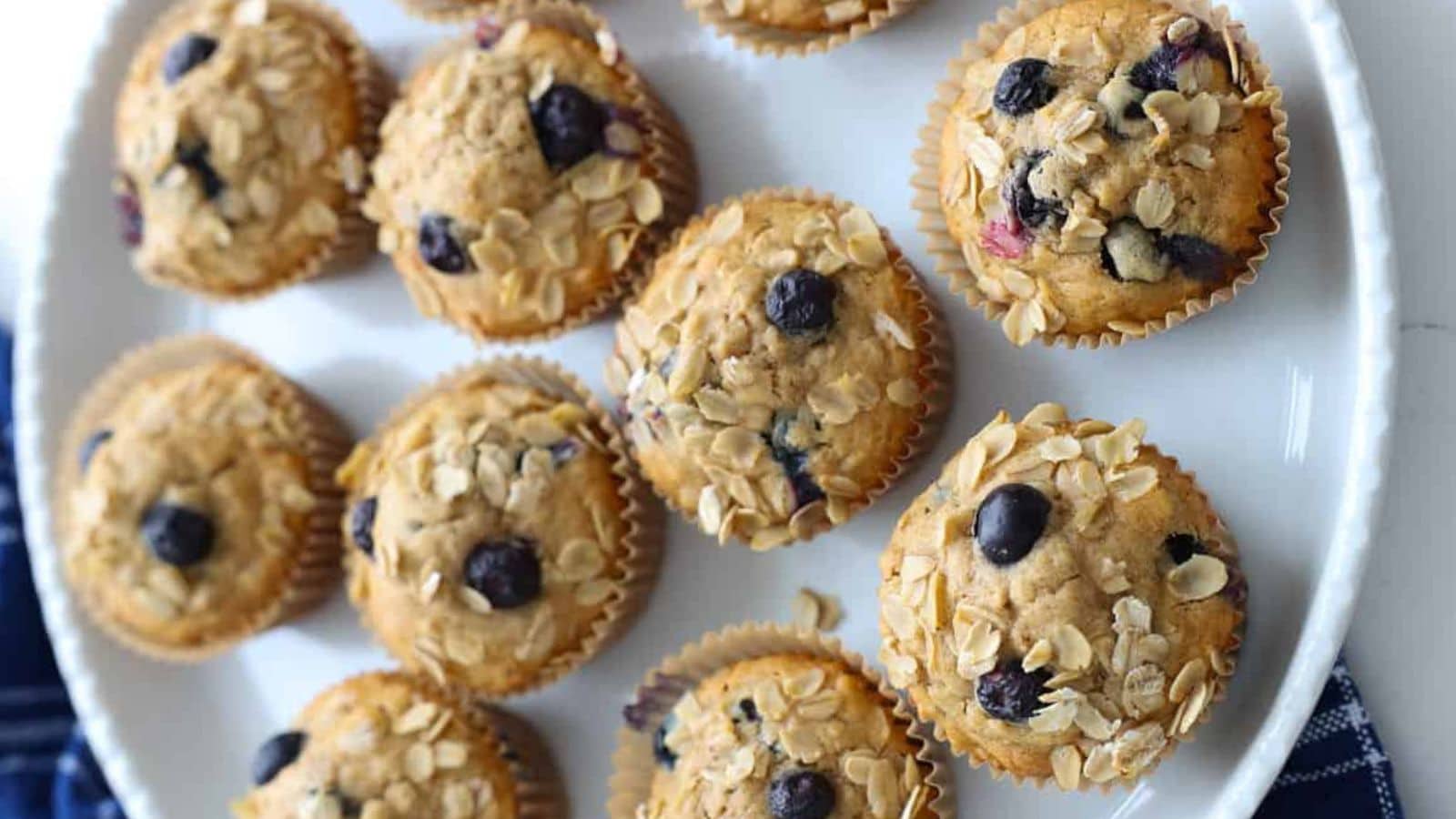 Blueberry oatmeal muffins baked hearty with oats and fresh berries.