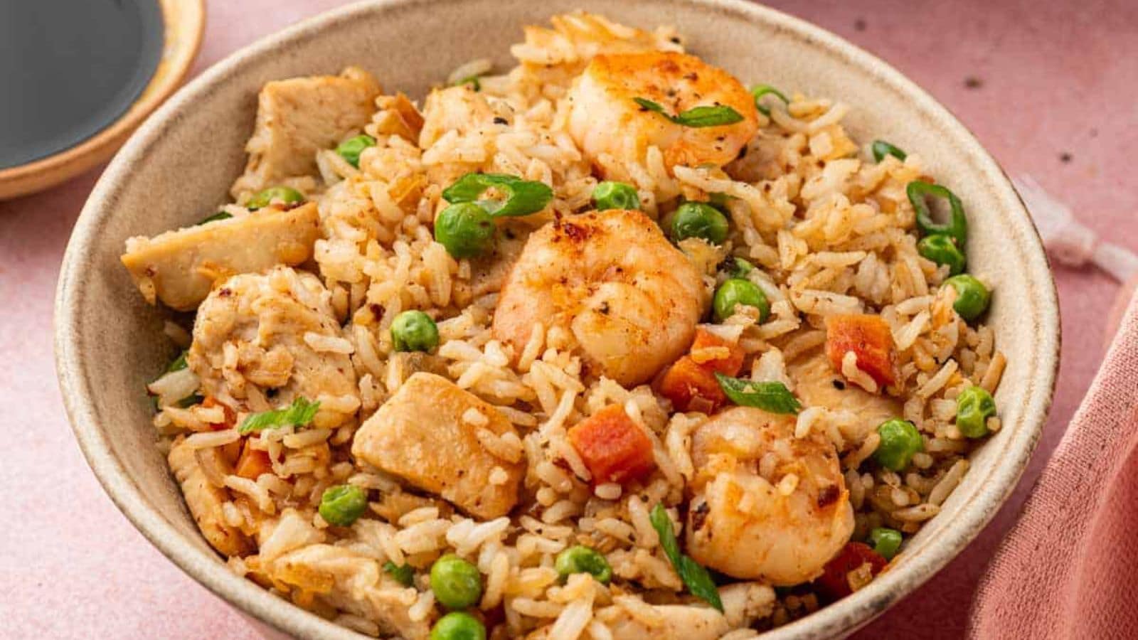 Fried rice tossed with chicken, shrimp, and savory seasonings.