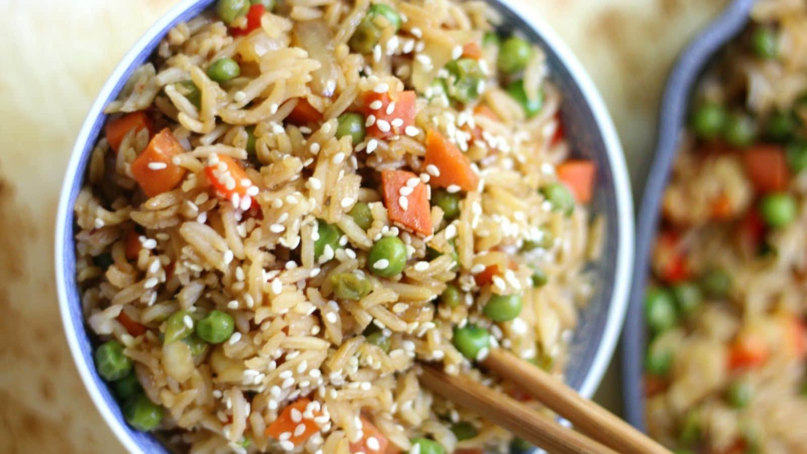 Vegetable fried rice cooked with mixed vegetables and fluffy seasoned rice.