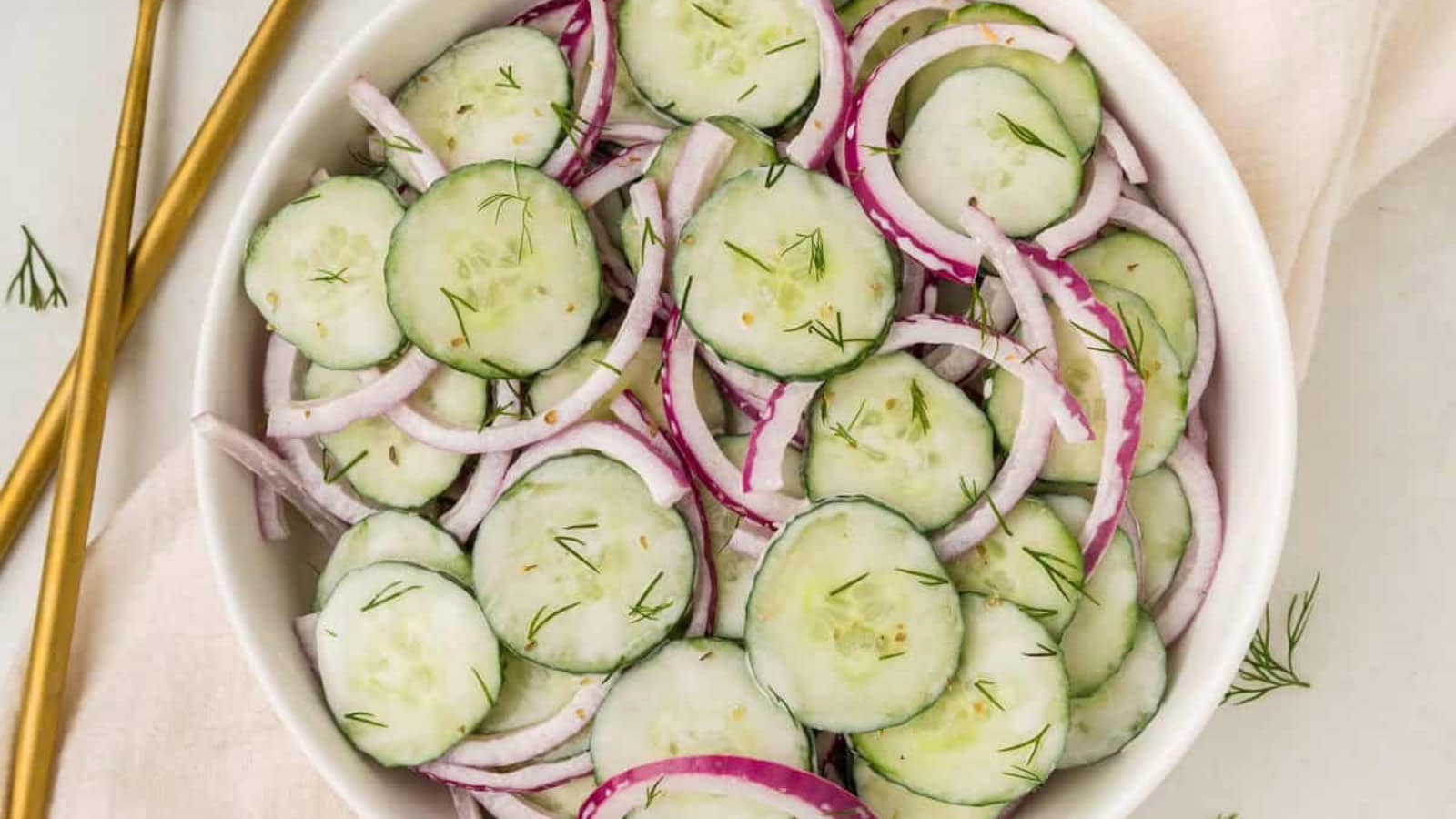 Cucumber salad tossed in a tangy light dressing.
