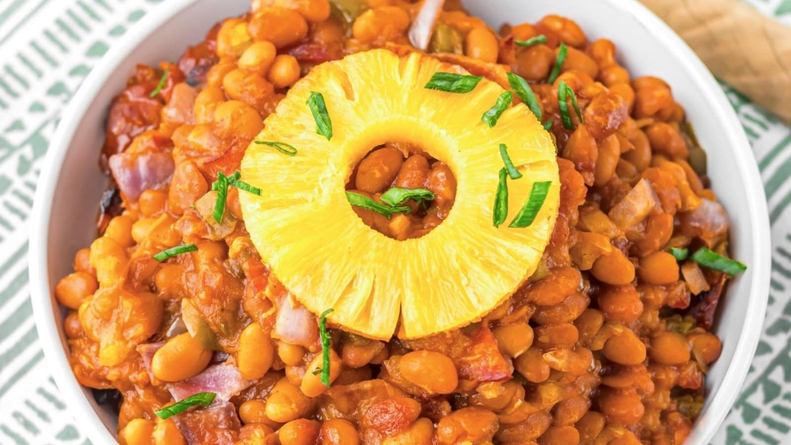 Baked beans mixed with sweet Hawaiian flavors and savory ingredients.