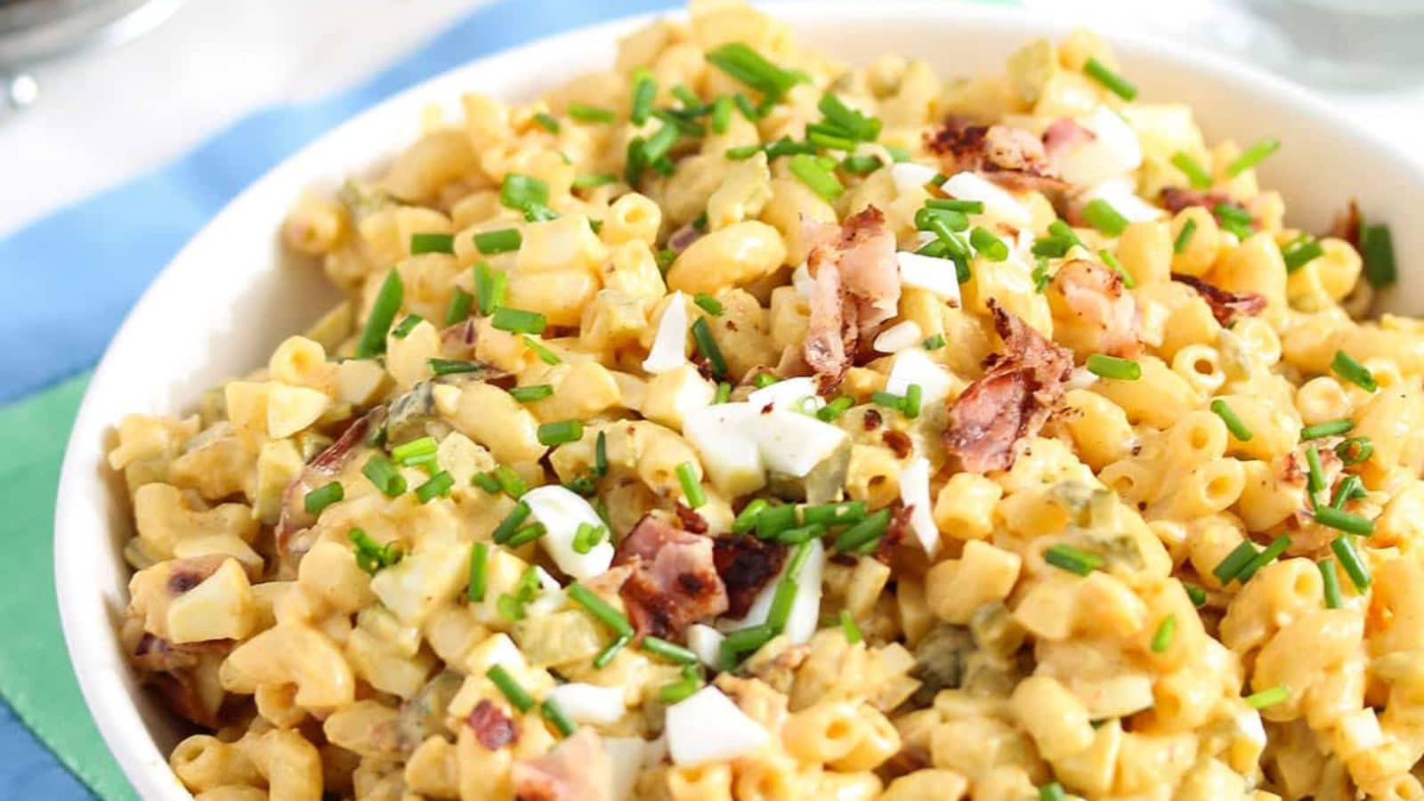 Pasta salad mixed with deviled egg filling, bacon, and creamy dressing.