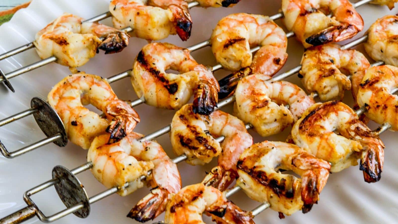 Chicken thigh skewers grilled with smoky edges and tender meat.