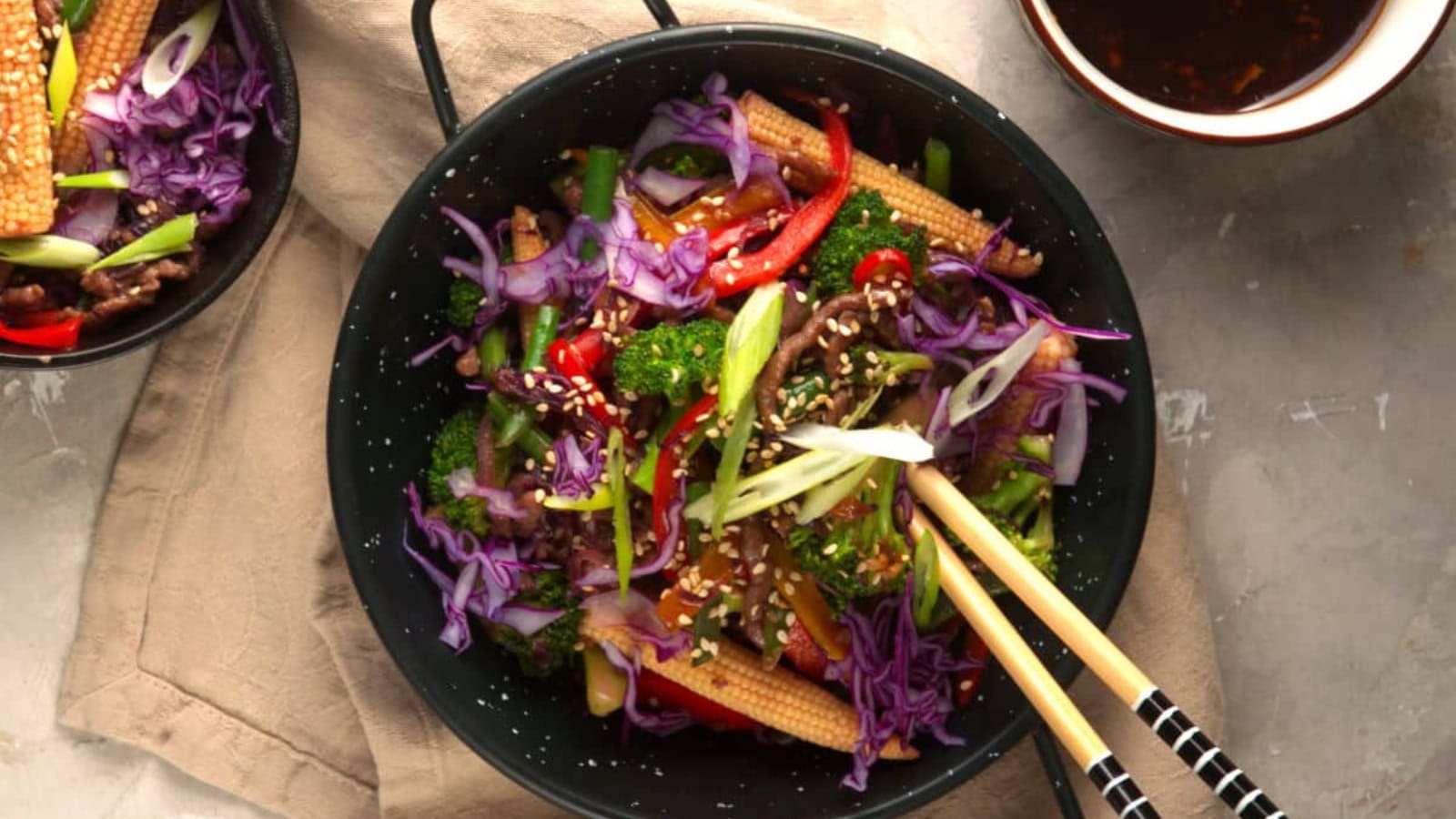 Ground beef stir fry tossed with vegetables in glossy savory sauce.