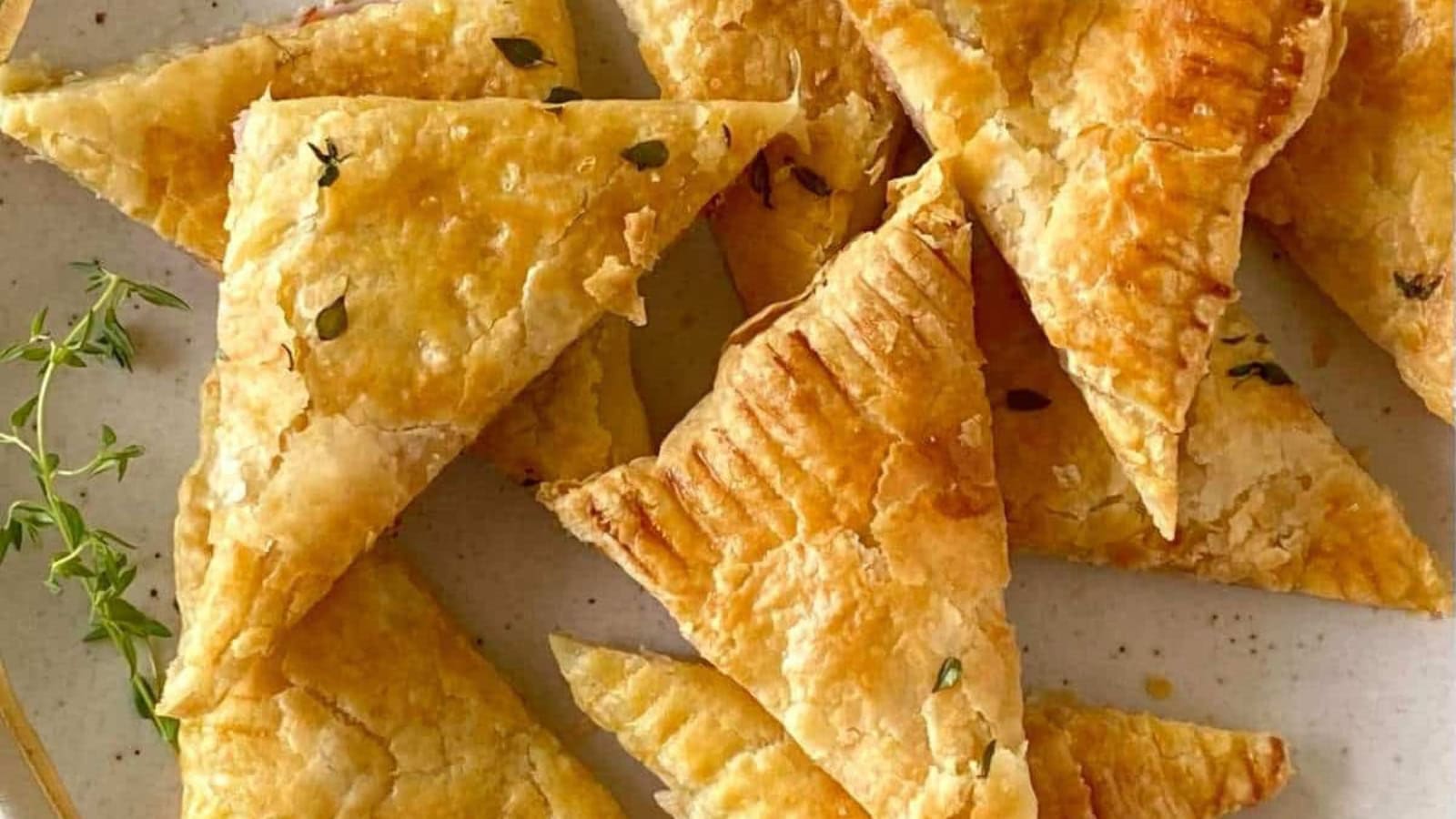 Puff pastry filled with ham and melted cheese baked golden and flaky.
