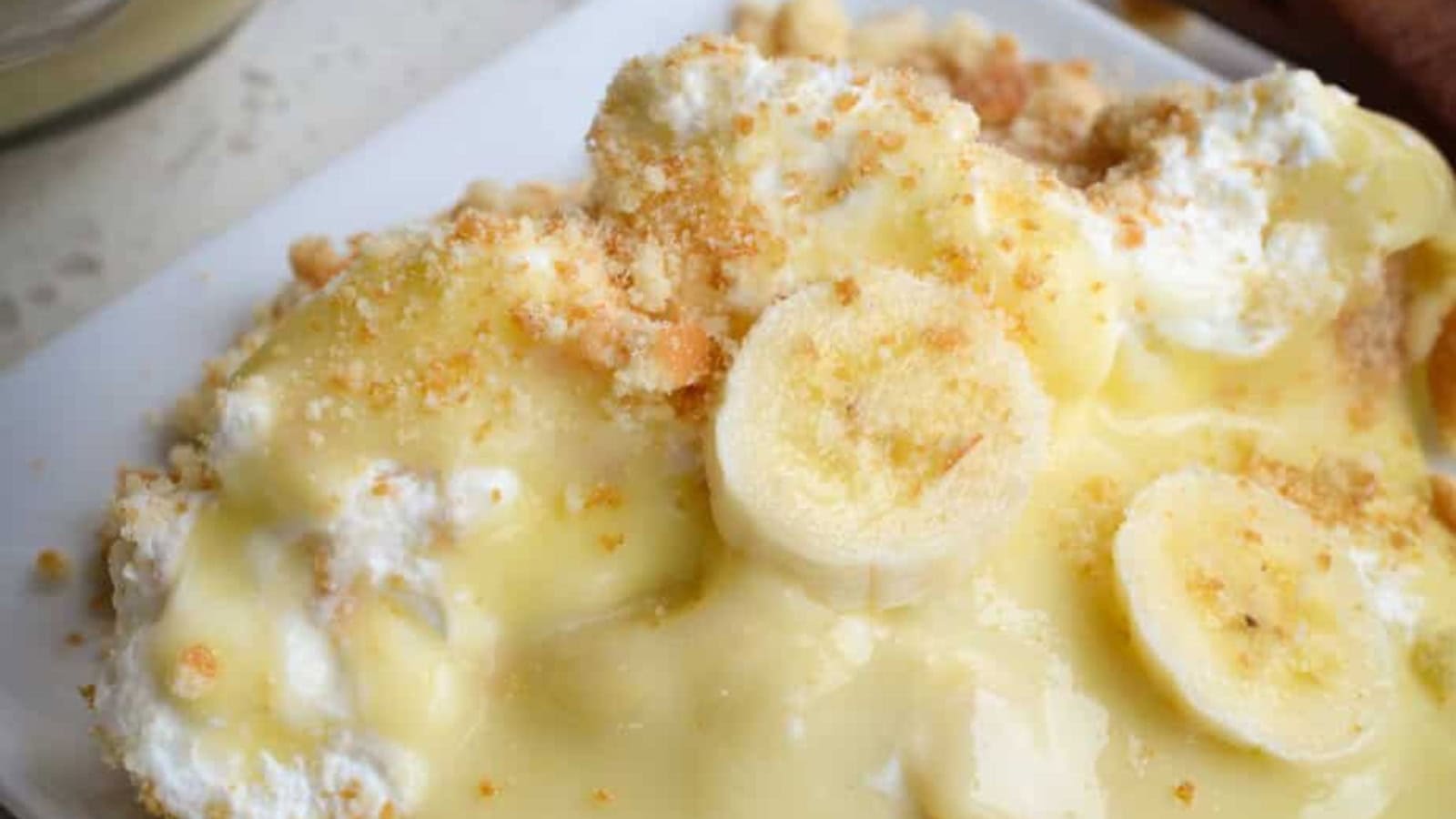 Banana pudding layered with bananas, cookies, and creamy pudding.