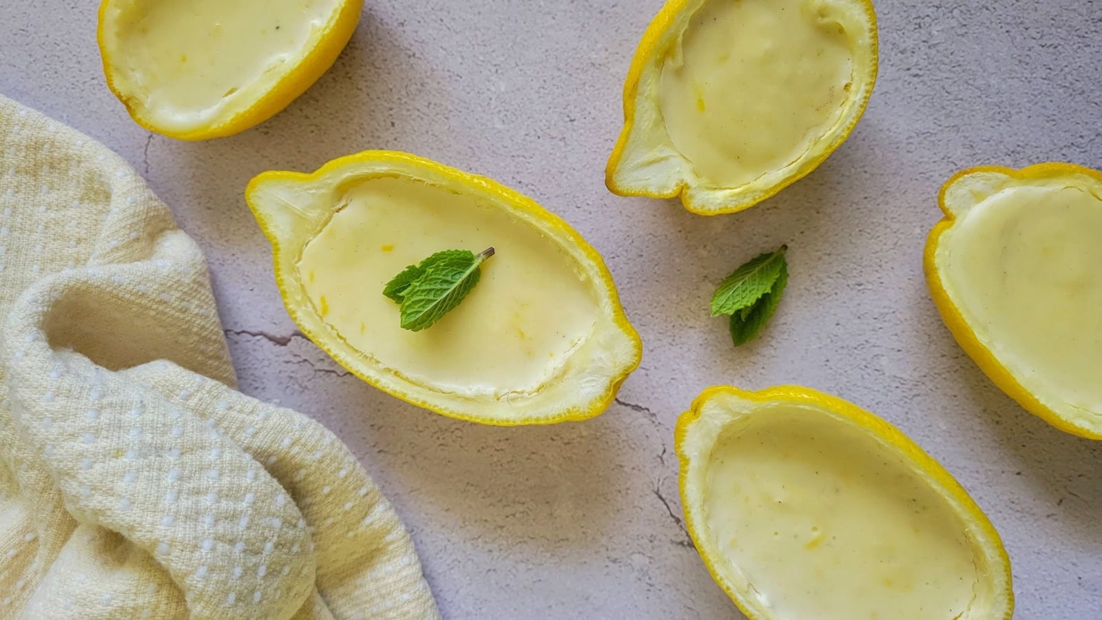Lemon posset served creamy with smooth citrus filling.