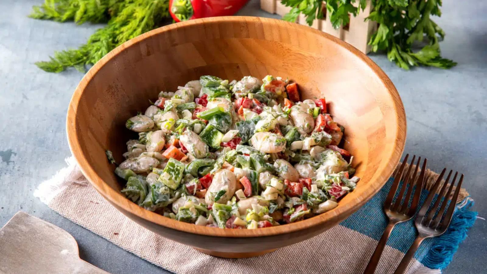 Bean salad tossed with vegetables, herbs, and Mediterranean dressing.