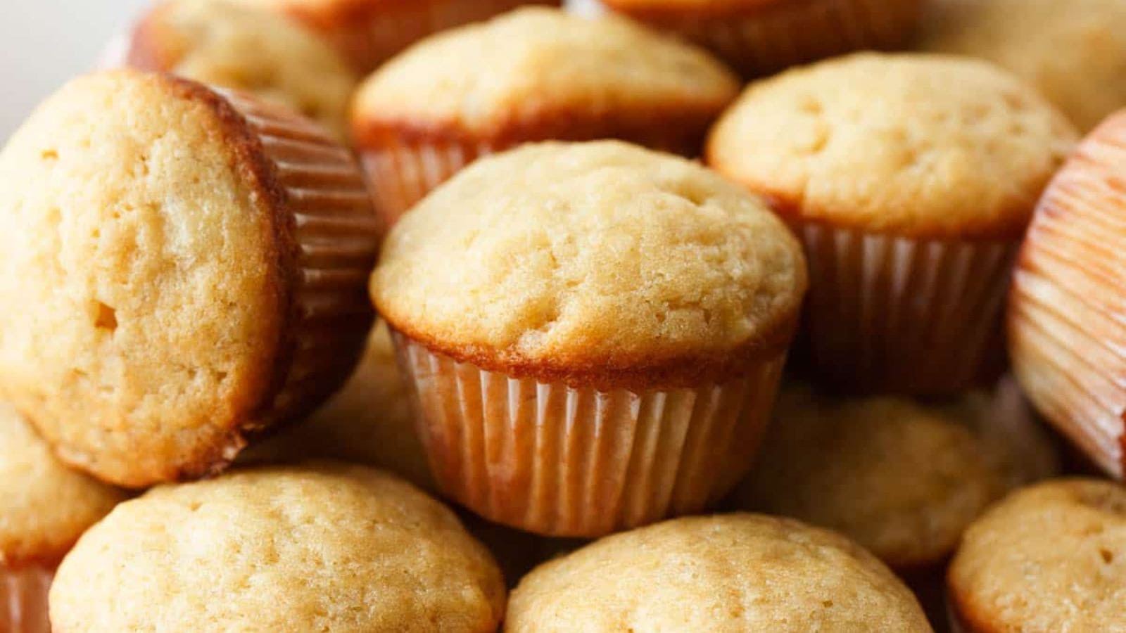 Mini banana muffins baked moist with soft centers and golden tops.