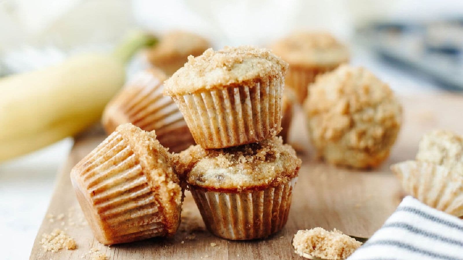 Mini banana muffins baked soft with cinnamon flavor and golden tops.