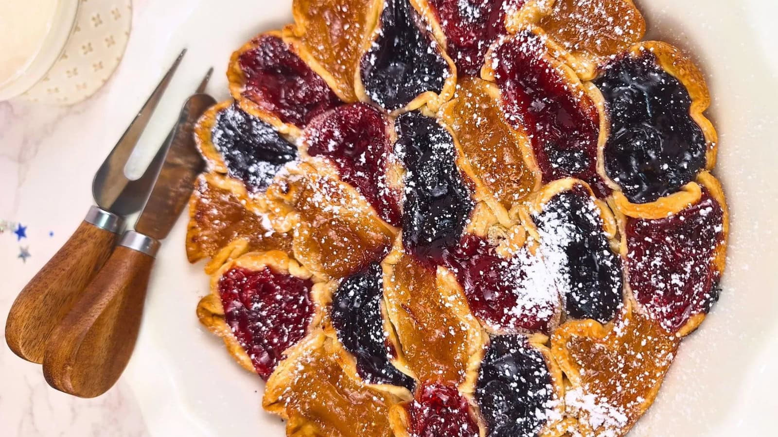 Patriotic pie decorated with red, white, and blue toppings.