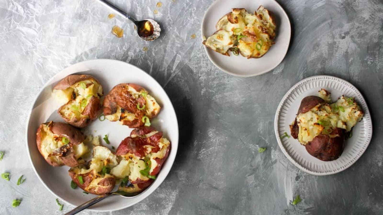 Smashed potatoes roasted crispy with salt and vinegar seasoning.