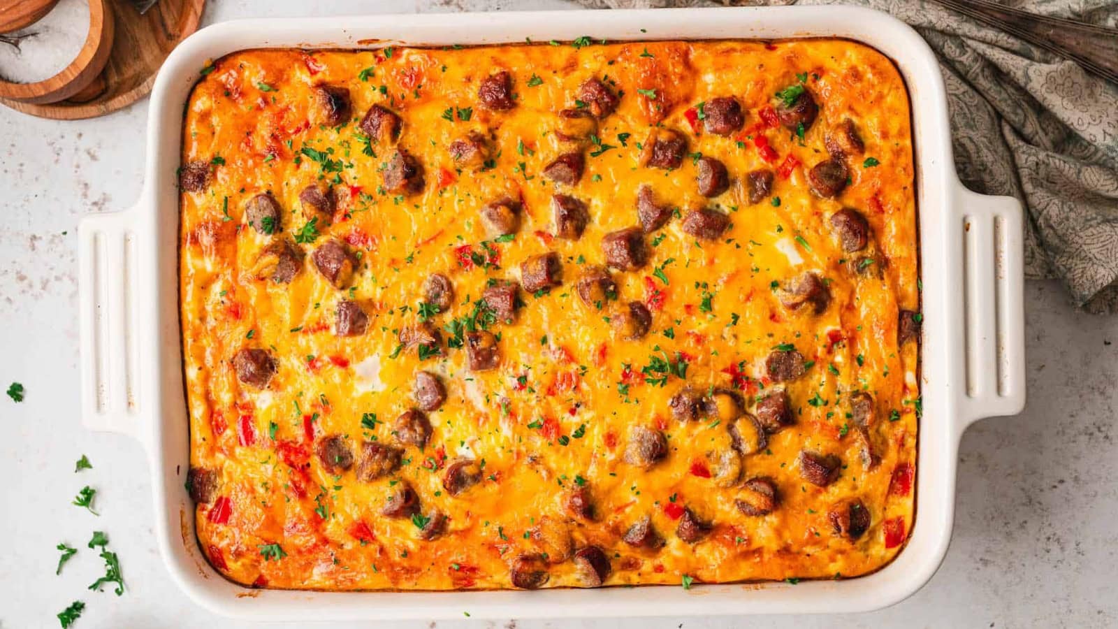 Sausage casserole baked with eggs, cheese, and savory breakfast sausage.
