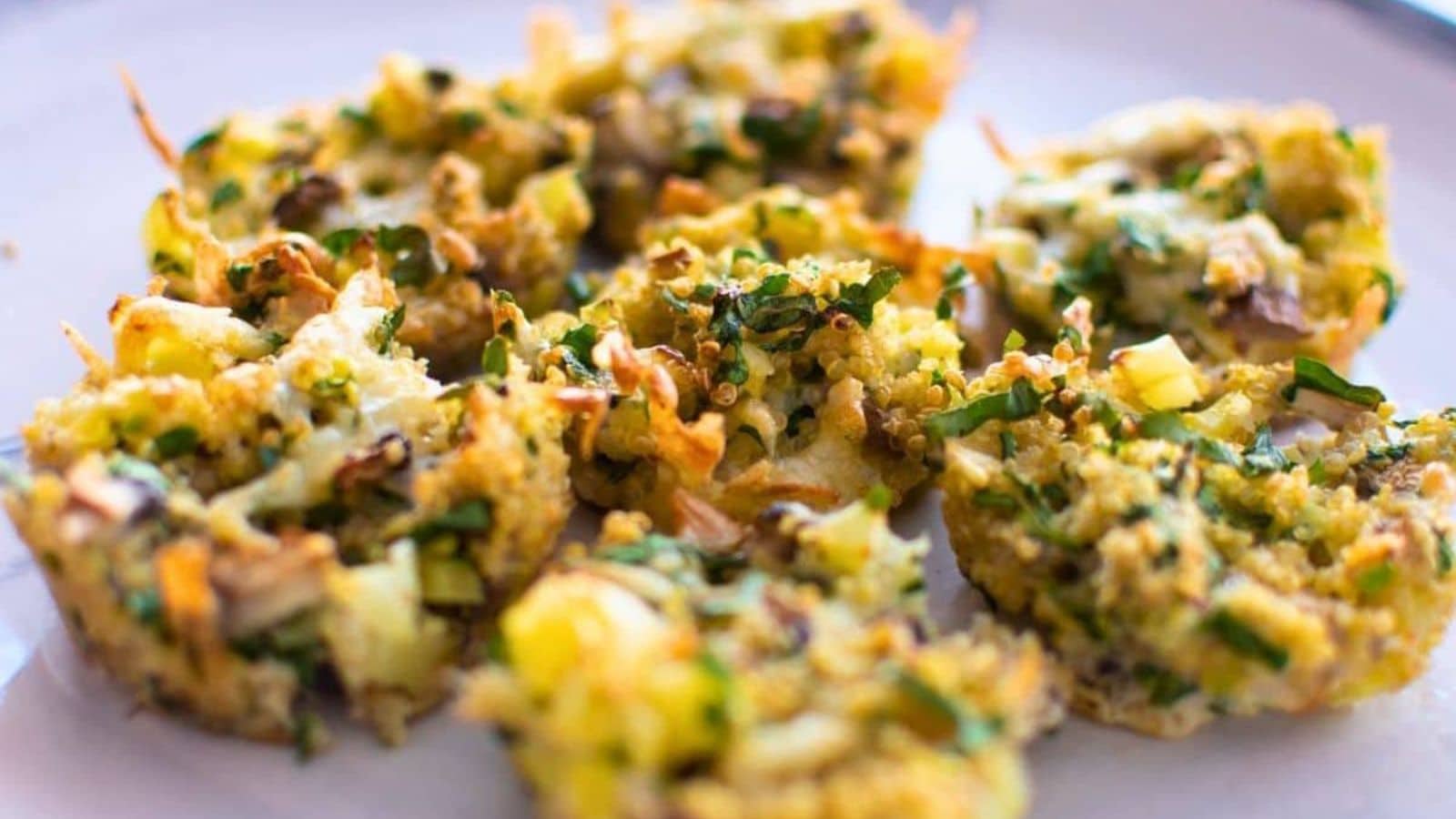 Savory quinoa muffins baked with grains and vegetables in a hearty texture.