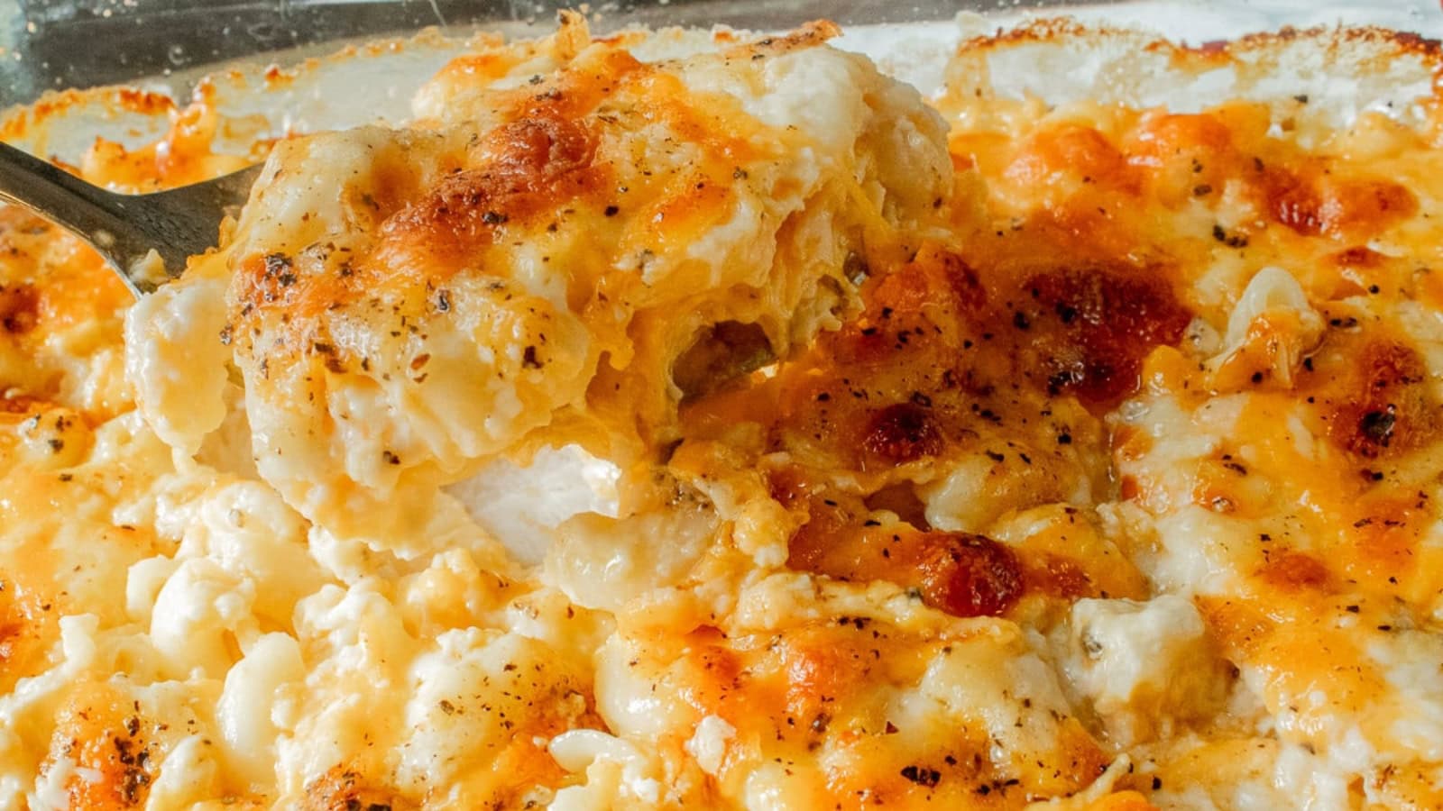 Baked mac and cheese with creamy sauce and golden top.