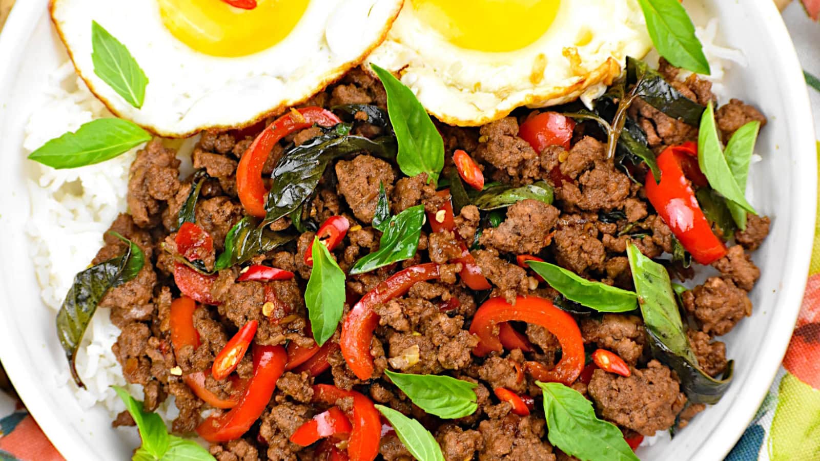 Thai basil beef served with fresh basil and savory seasoned beef.
