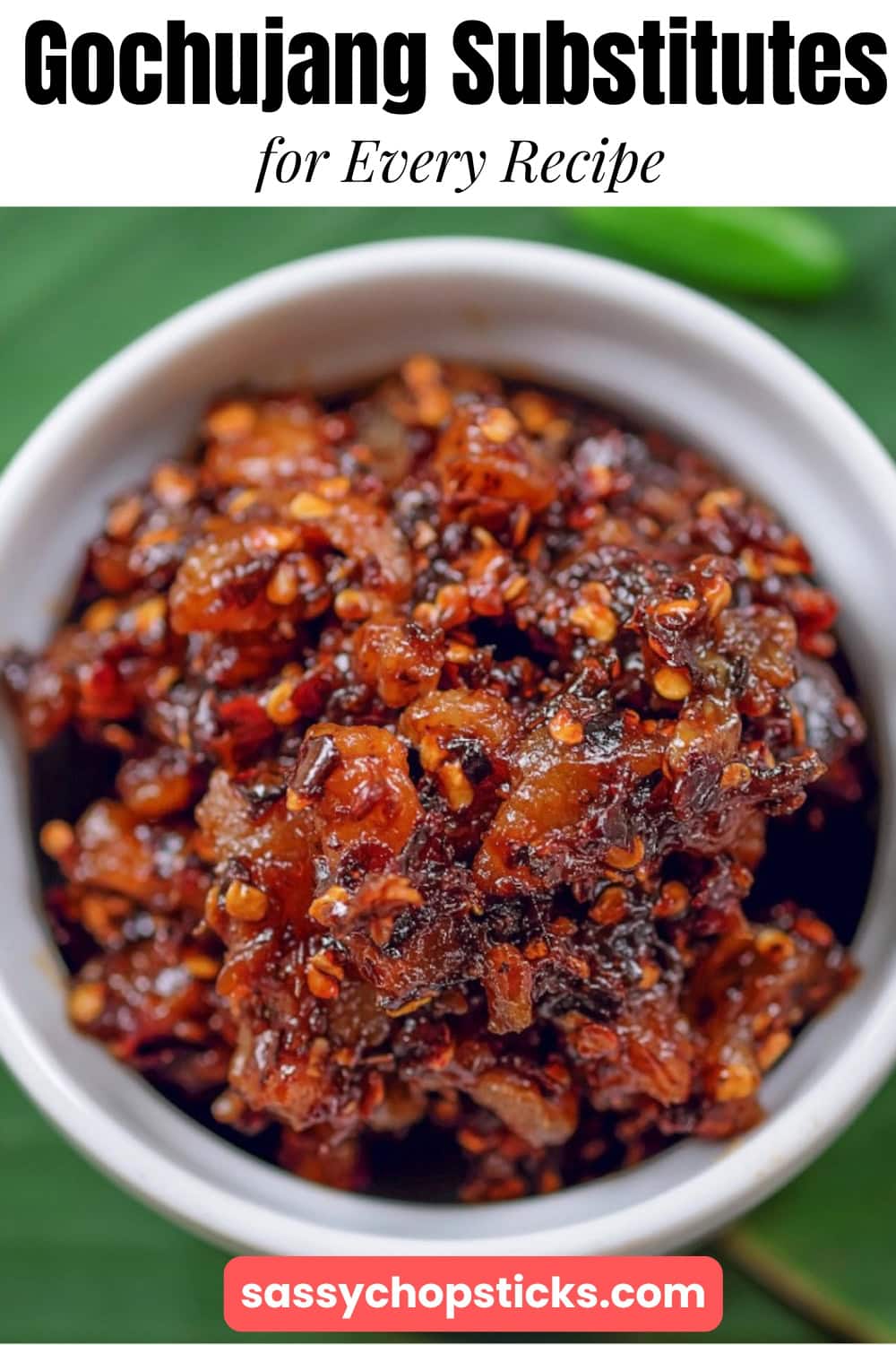 Small bowl of spicy gochujang substitute paste with red pepper flakes.