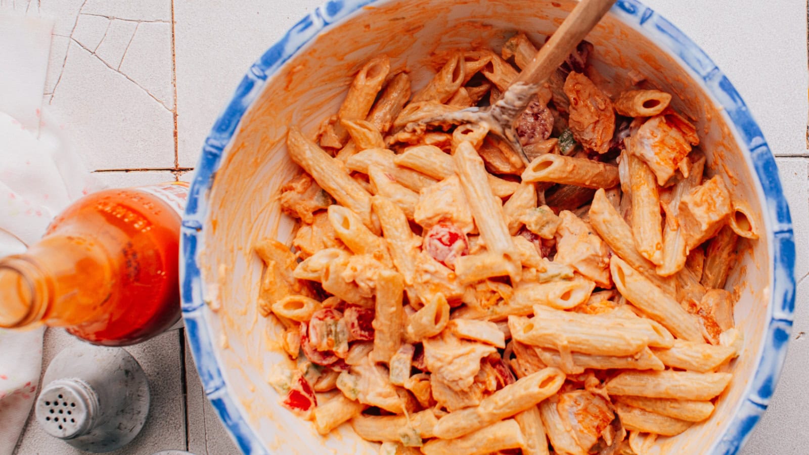 Buffalo chicken pasta salad tossed in a creamy spicy dressing.