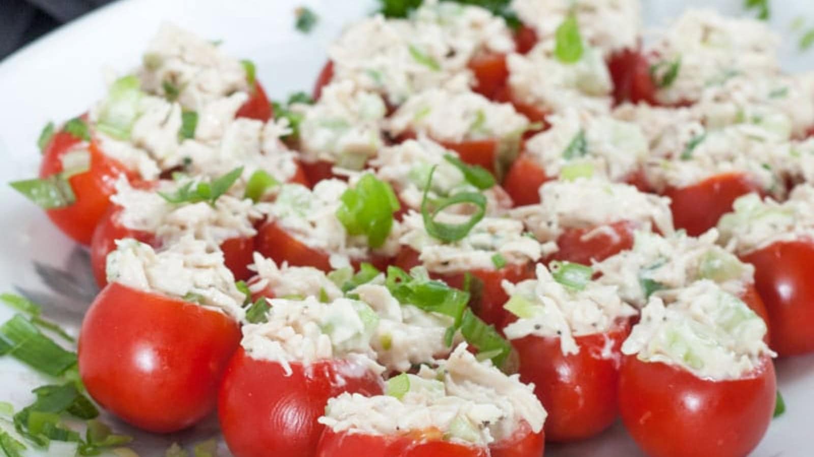 Cherry tomatoes stuffed with a creamy chicken filling and herbs.