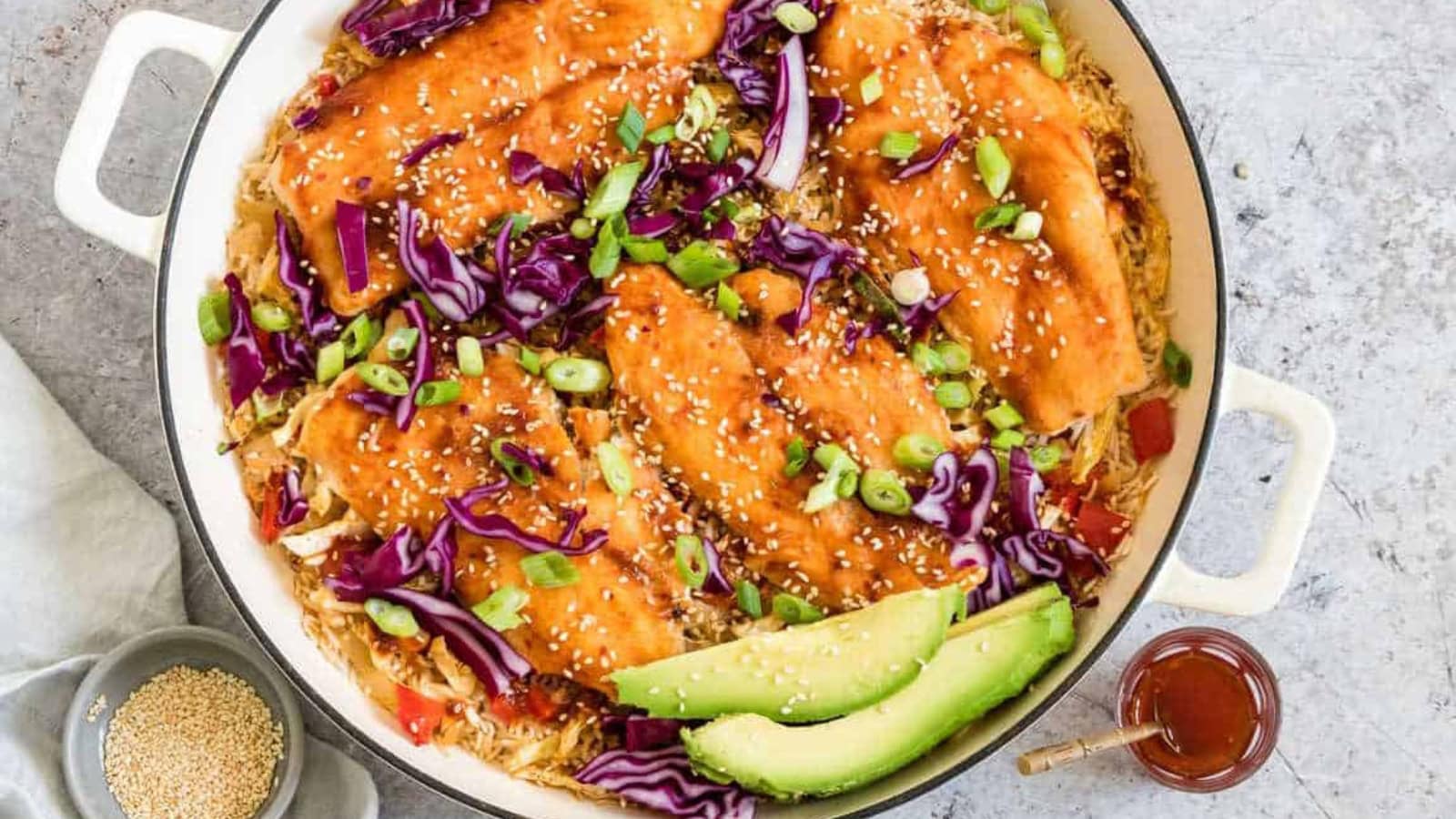 One-pot rice cooked with fish and Asian-inspired seasonings.