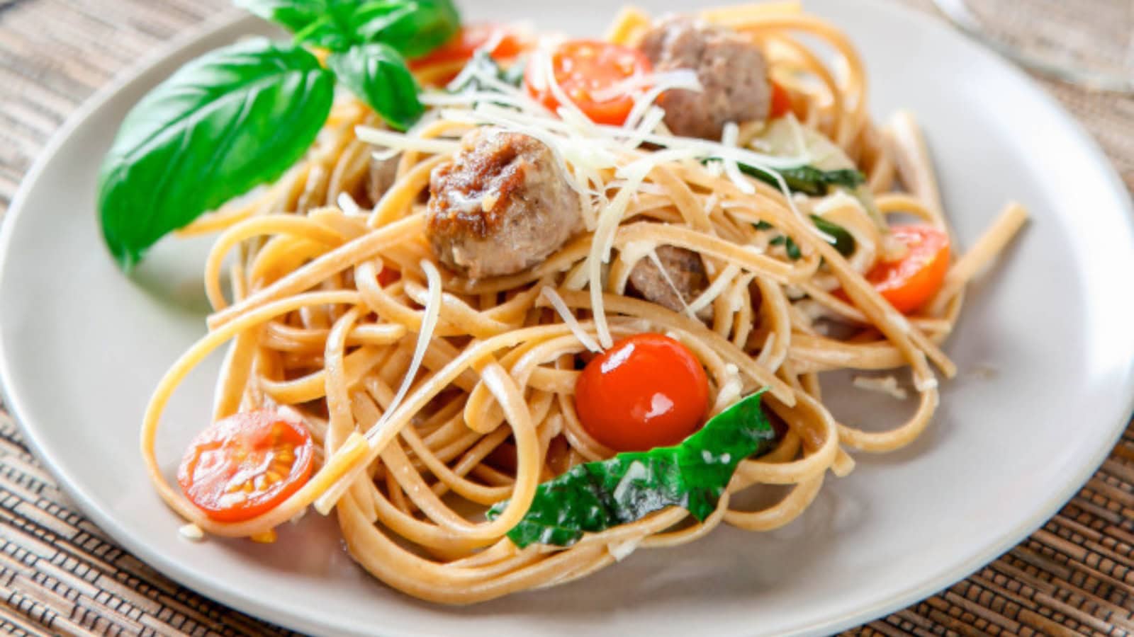 One-pot sausage pasta with a rich tomato sauce and tender pasta.