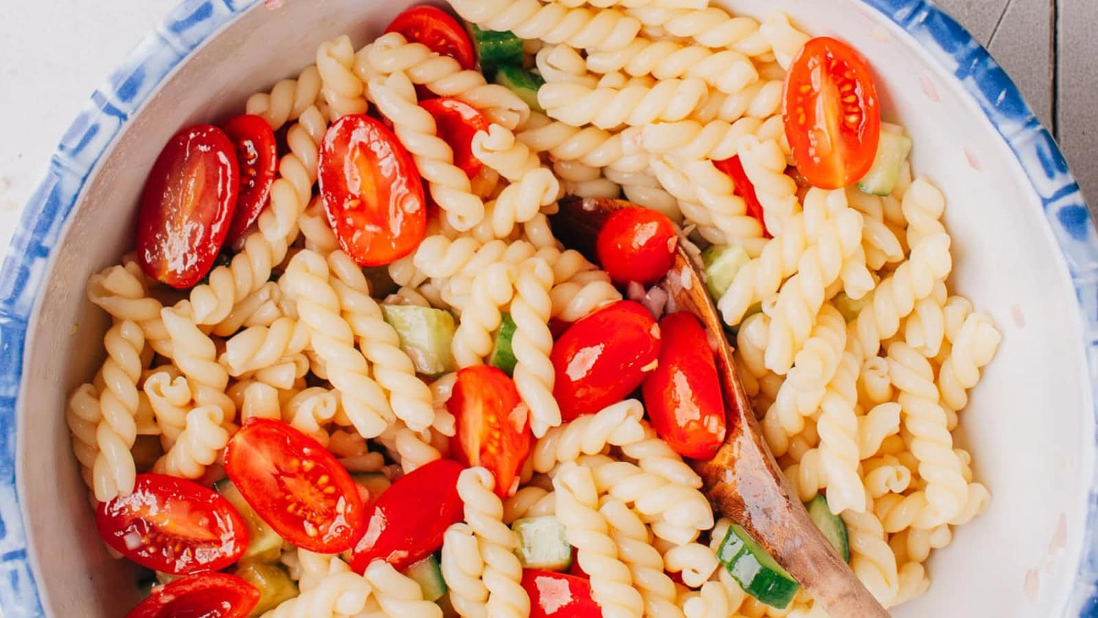 Pasta salad tossed with vegetables and Italian dressing.