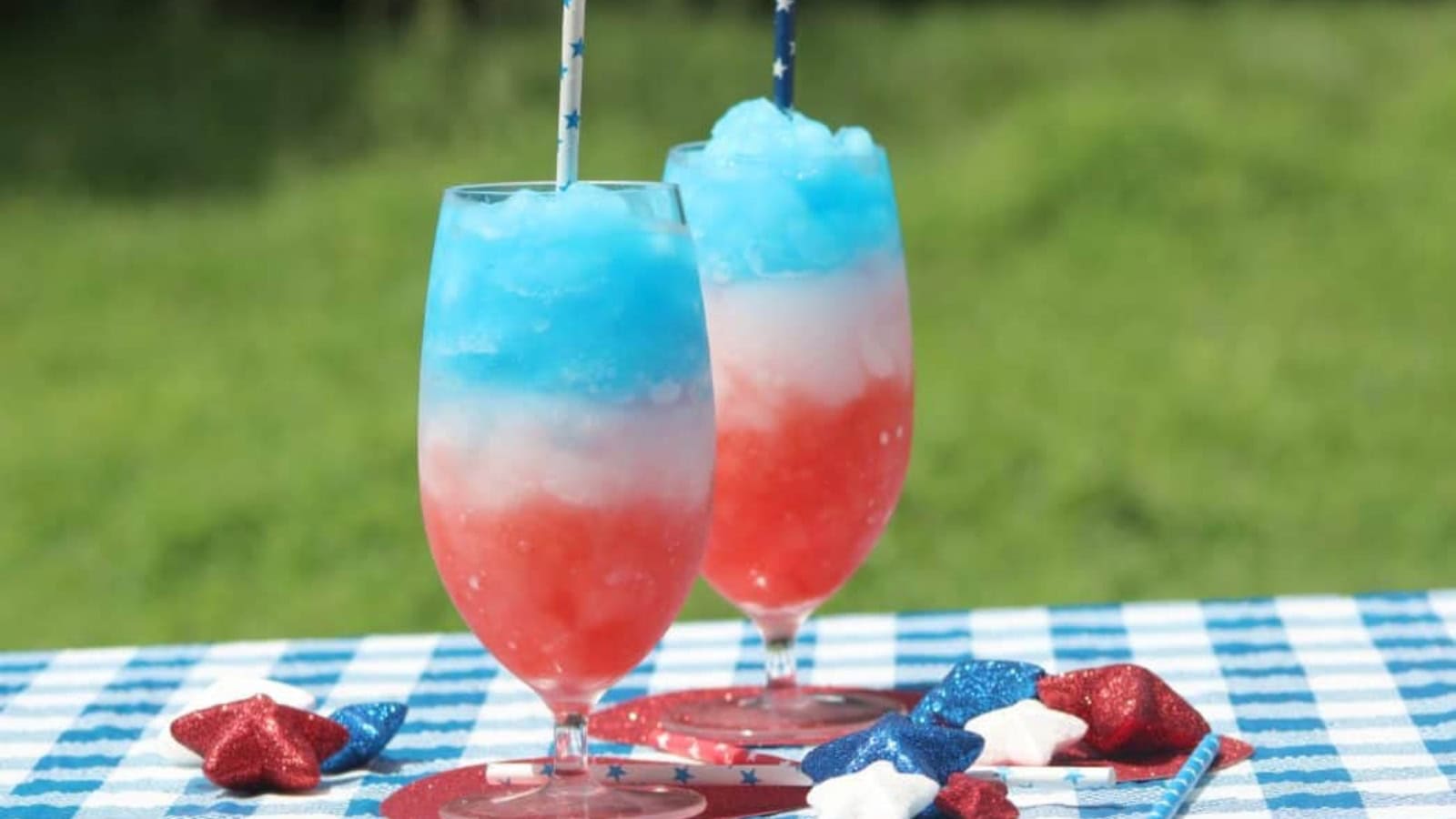 Festive summer drink garnished with colorful fruit for holiday celebrations.