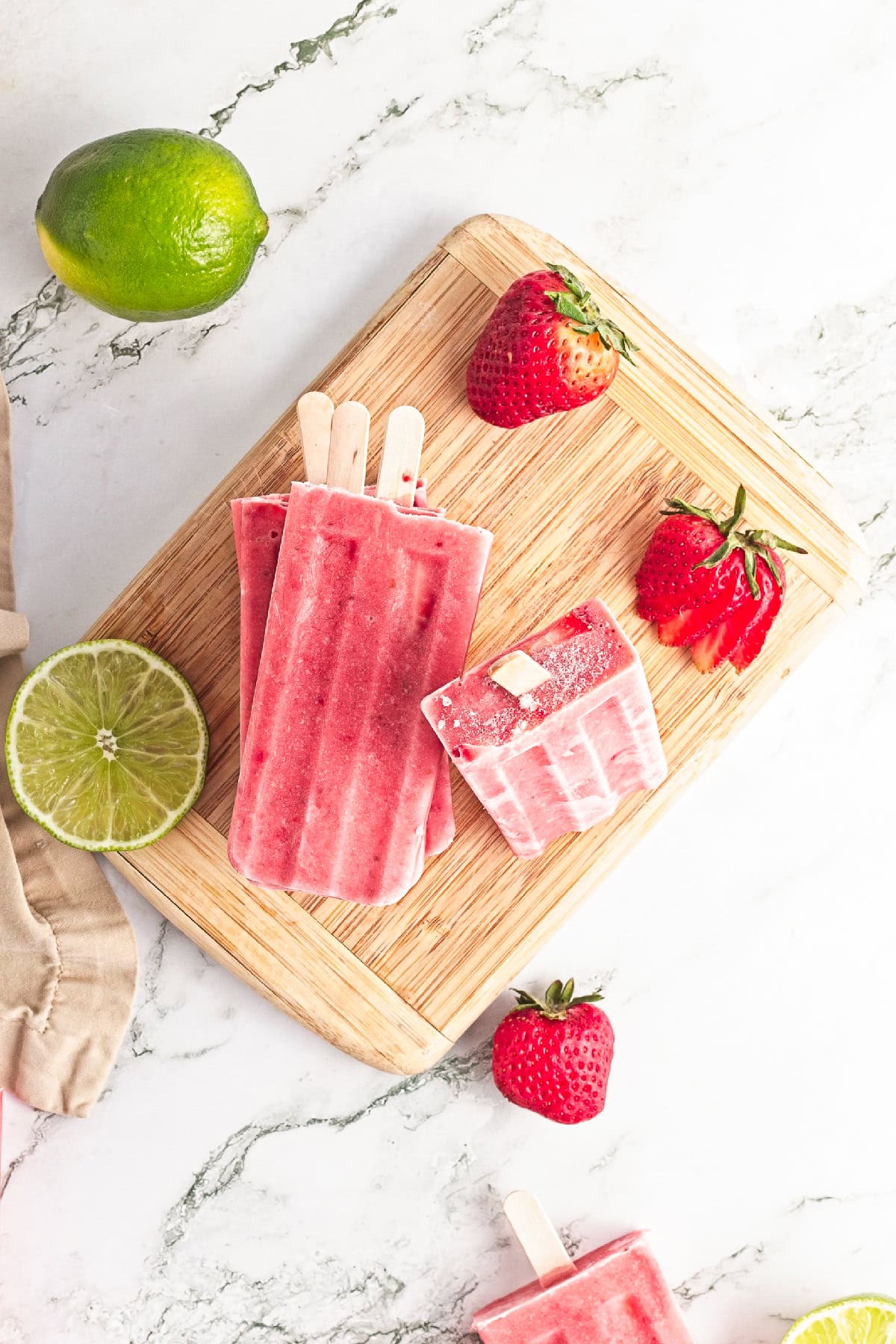 Strawberry popsicle mold filled and ready to freeze until firm.